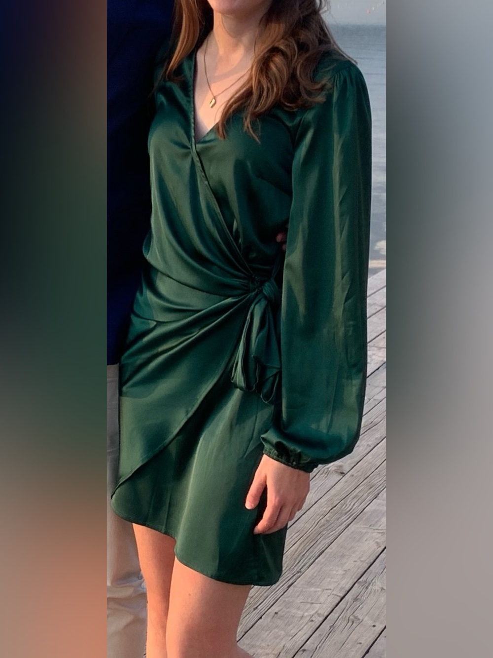 Green satin wrap mini dress with long sleeves